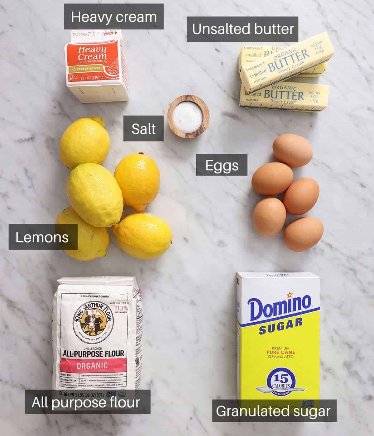 An overhead shot of all the ingredients you need to make a lemon tart.