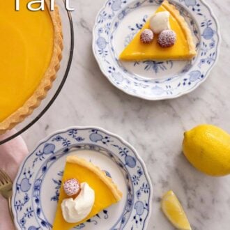 Pinterest graphic showing two slices of lemon tart on patterned plates on a countertop.