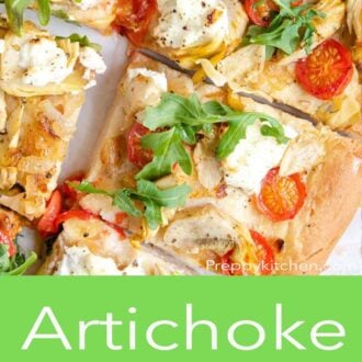 An overhead shot of artichoke pizza cut into slices