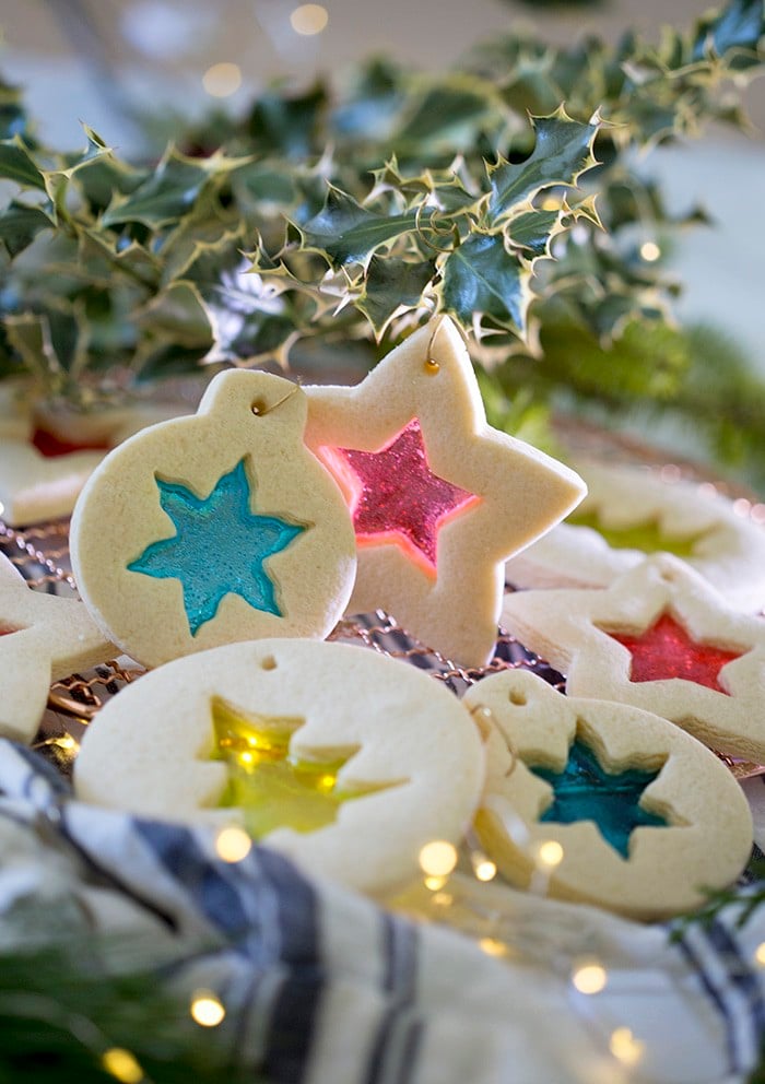 A photo of Stained glass cookies lit with small lights from behind