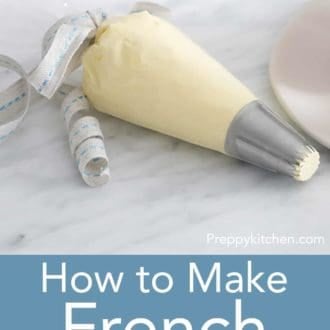piping bag full of french buttercream on a marble counter