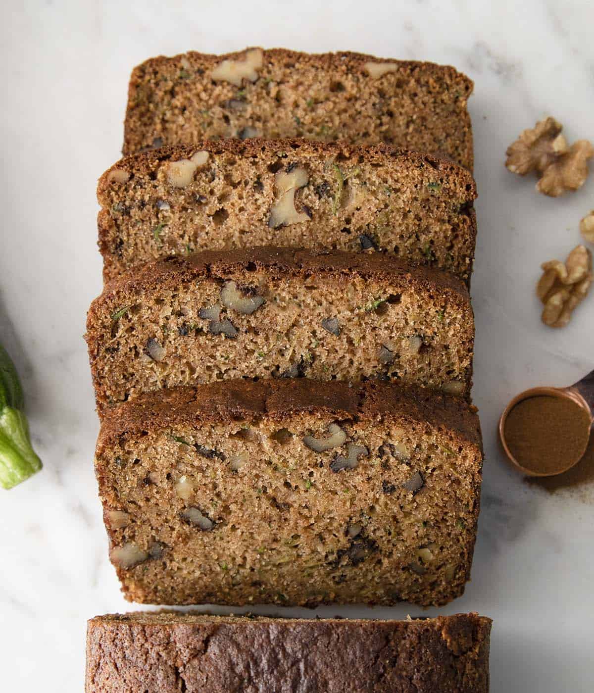 Four slices of Zucchini bread.