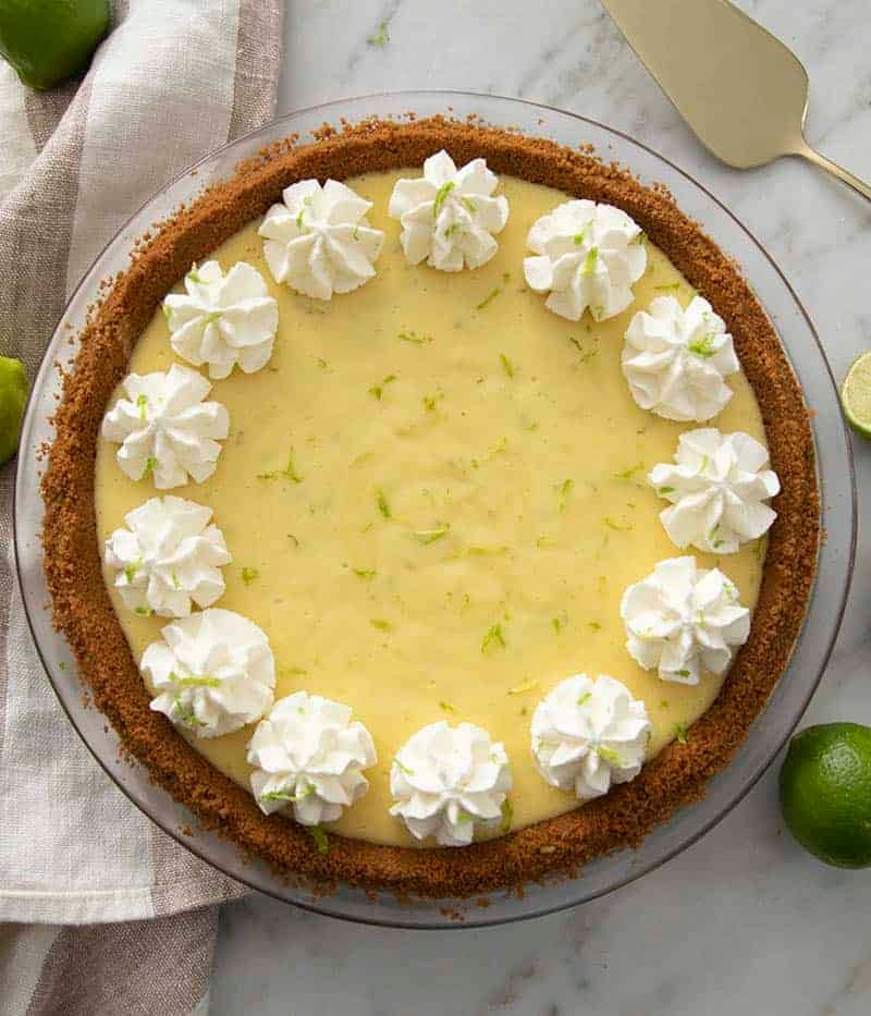An overhead shot of key lime on a countertop.
