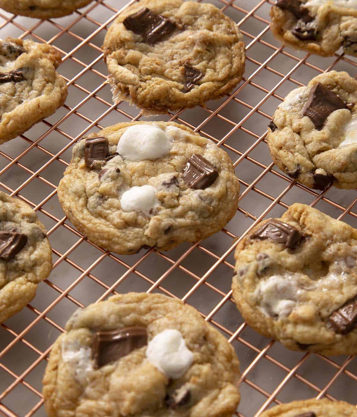 Smores Cookies on a copper cooling rack.