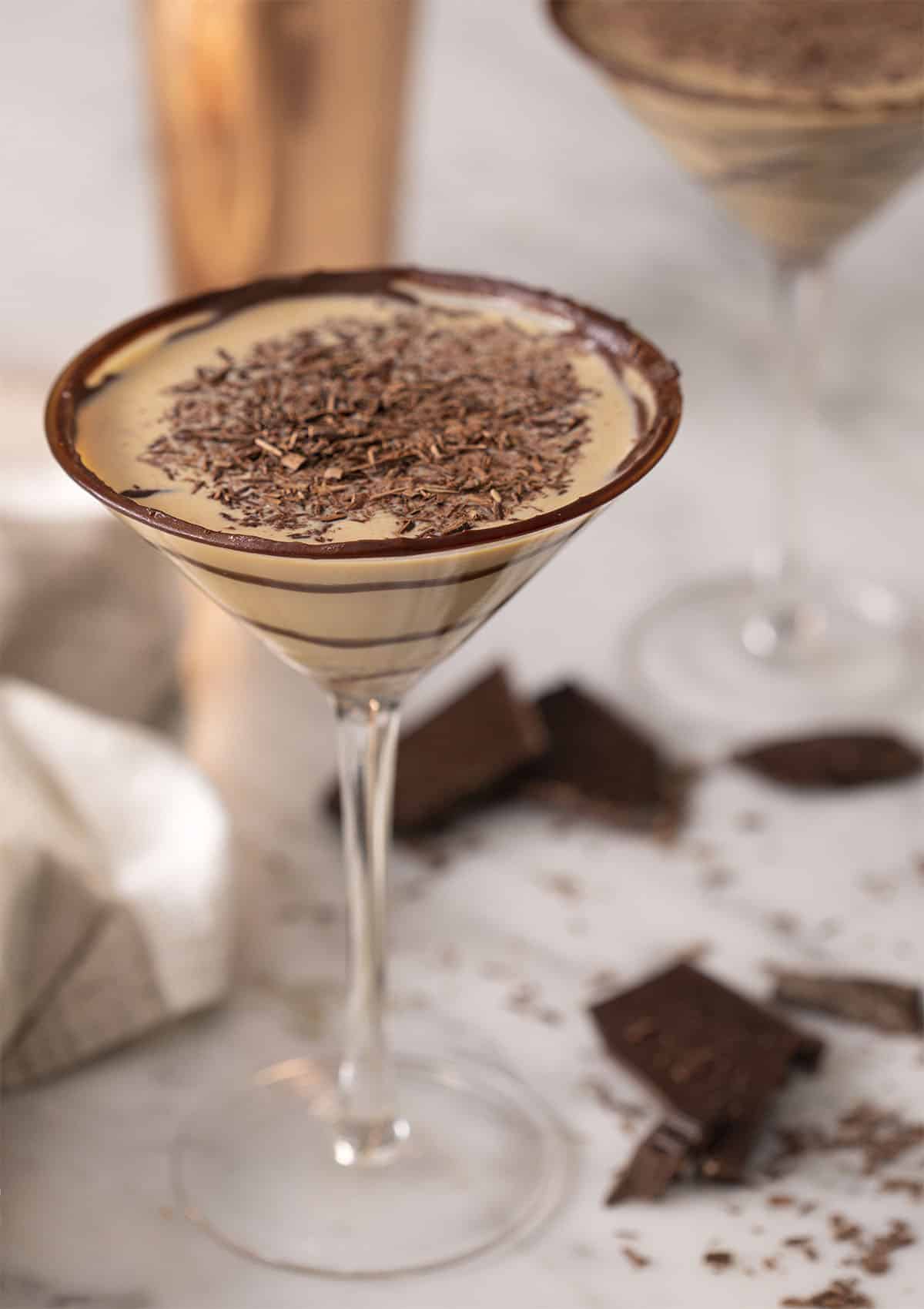 A chocolatini topped with shaved chocolate.
