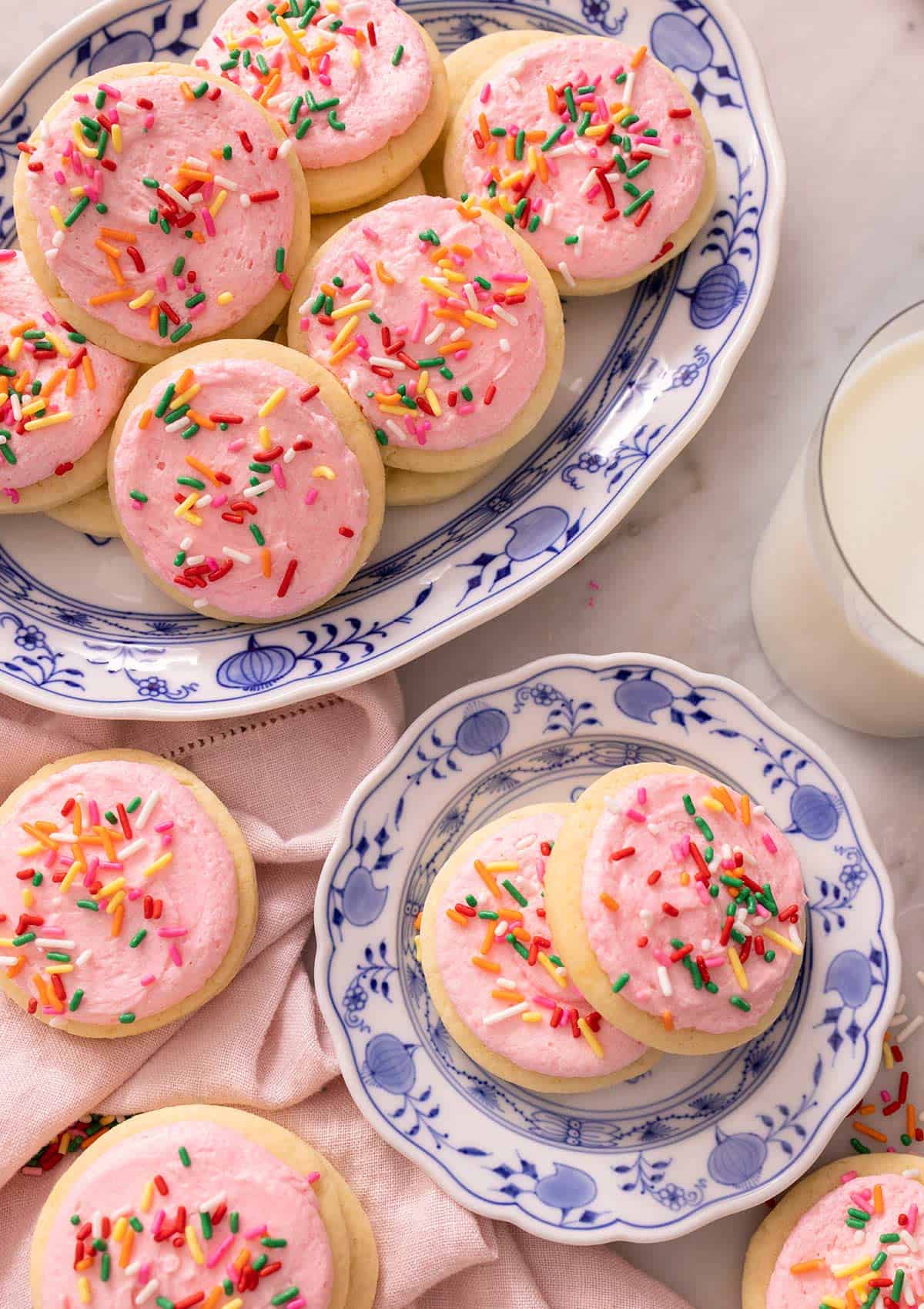 Lofthouse cookies on a small blue plate and a large serving plate