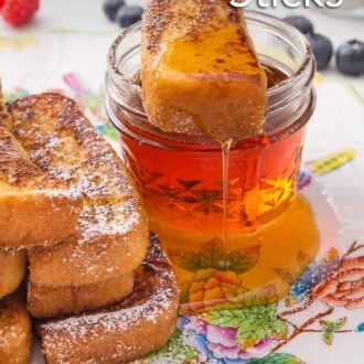 Pinterest graphic of a French toast stick with syrup dripping off laid over top of a small mason jar of maple syrup.