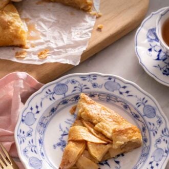 Pinterest graphic of a slice of apple galette on a plate in front of the rest of the galette on a cutting board.