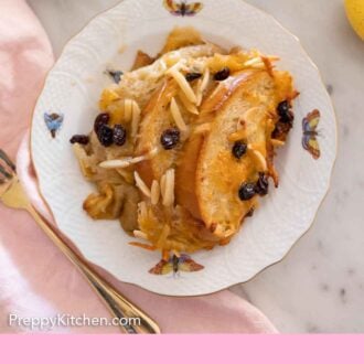 Pinterest graphic of an overhead view of a plate of capirotada.