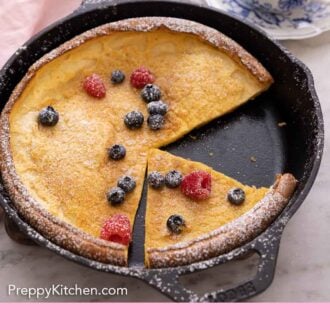Pinterest graphic of a cast iron skillet with a Dutch baby with a slice removed and slice cut.