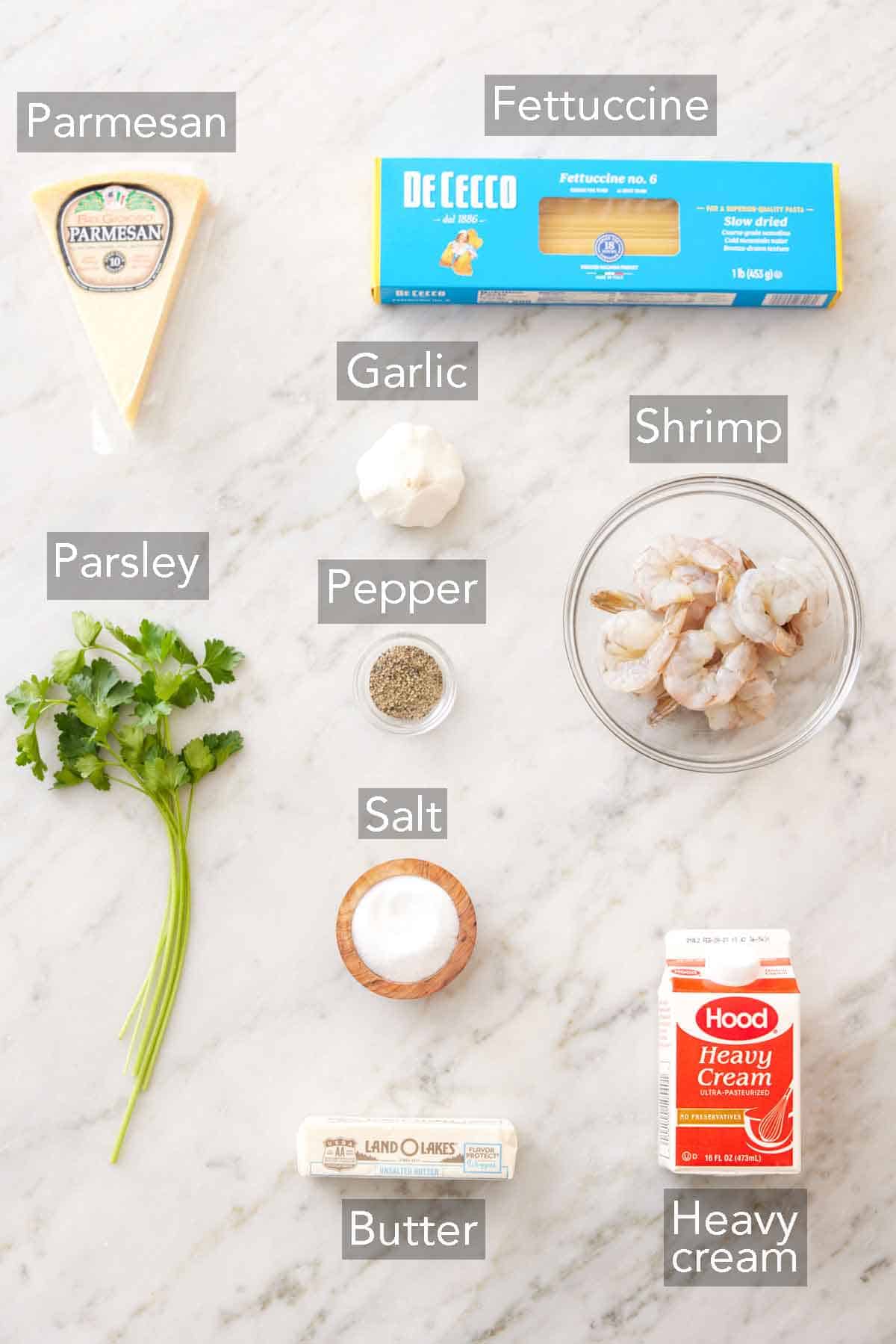 Ingredients needed to make shrimp Alfredo.