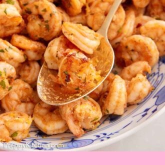 Pinterest graphic of a spoonful of sautéed shrimp in a serving platter.