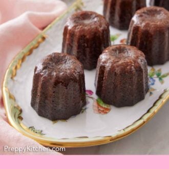 Pinterest graphic of a platter of canelés.