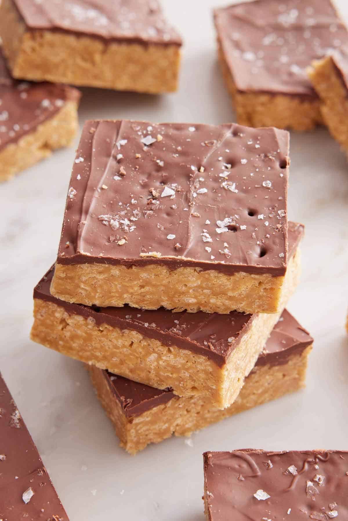 A stack of three Special K bars with more surrounding it.